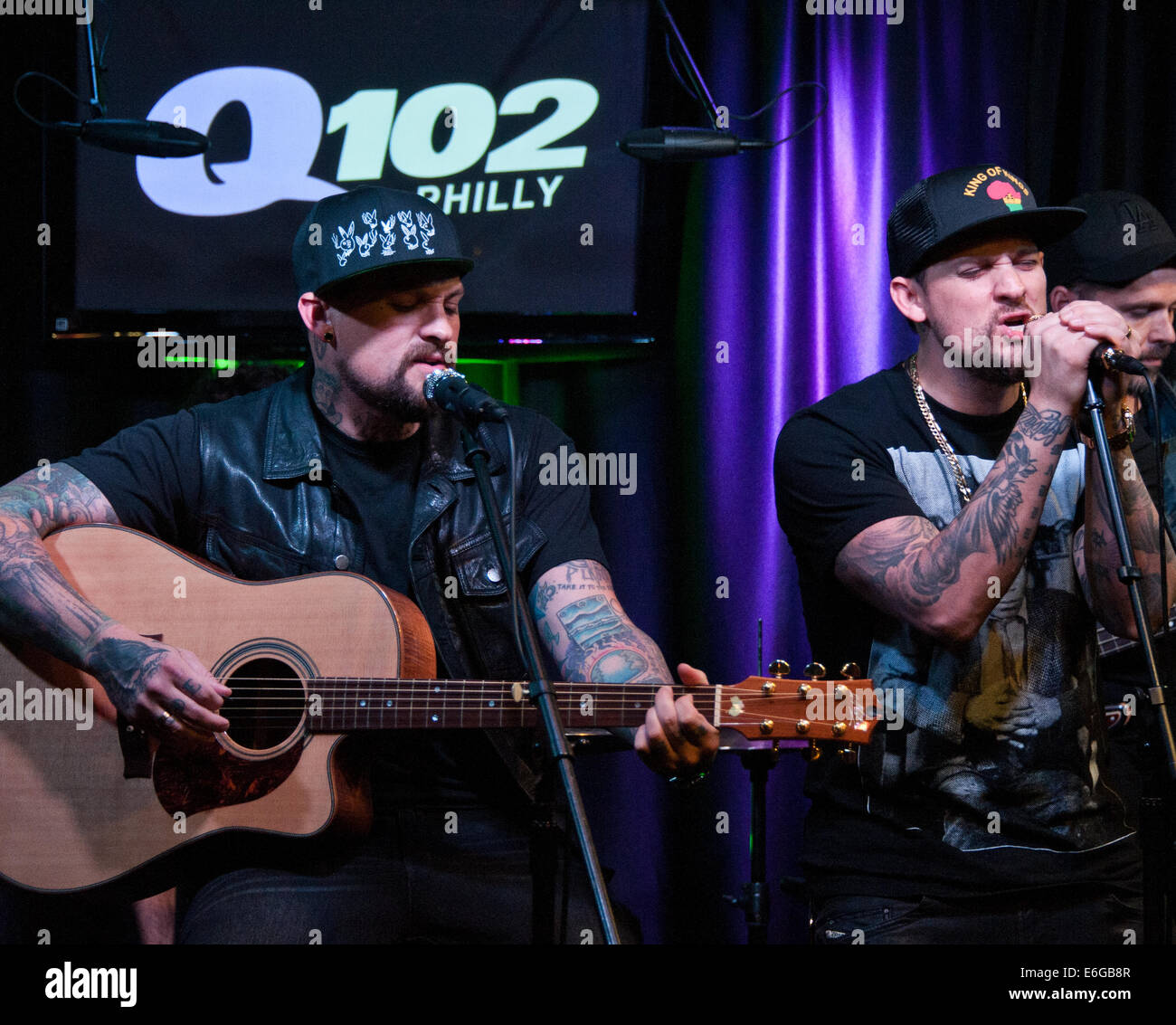 Bala Cynwyd, Pennsylvania, USA. 21st August, 2014. (L to R) Benji Madden and Joel Madden of American Pop Rock Duo The Madden Brothers Perform at Q102's Performance Theatre on August 21, 2014 in Bala Cynwyd, Pennsylvania, United States. Credit:  Paul Froggatt/Alamy Live News Stock Photo
