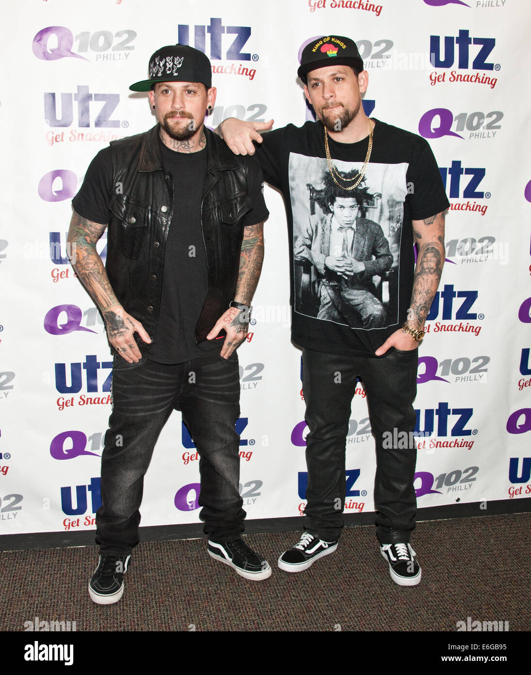 Bala Cynwyd, Pennsylvania, USA. 21st August, 2014. (L to R) Benji Madden and Joel Madden of American Pop Rock Duo The Madden Brothers Pose at Q102's Performance Theatre on August 21, 2014 in Bala Cynwyd, Pennsylvania, United States. Credit:  Paul Froggatt/Alamy Live News Stock Photo