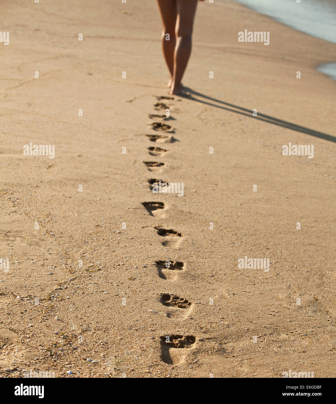 Barefoot walk woman footprints hi-res stock photography and images - Alamy