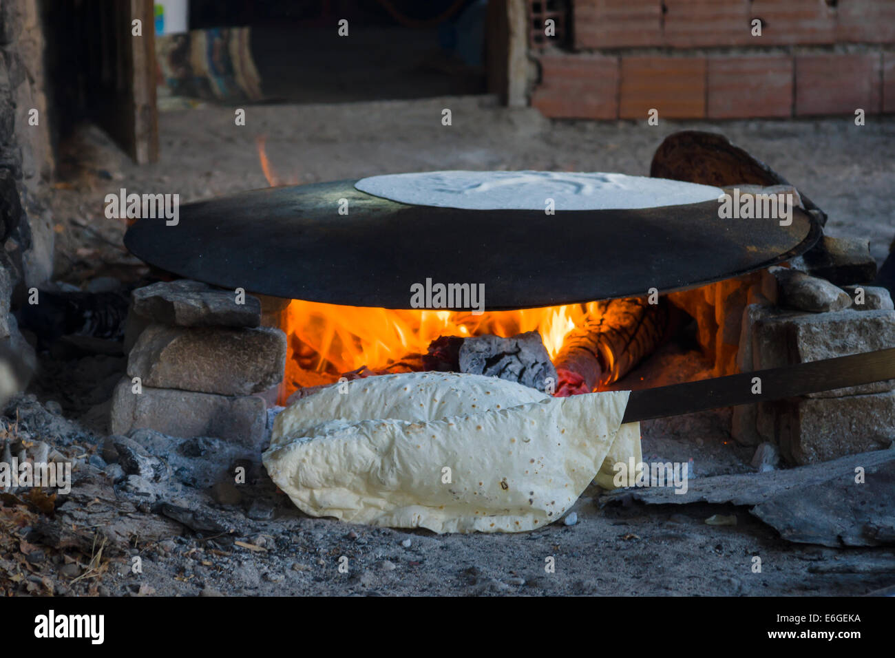 Traditional rustic flatbread cooked on an open fire. Turkey Stock Photo