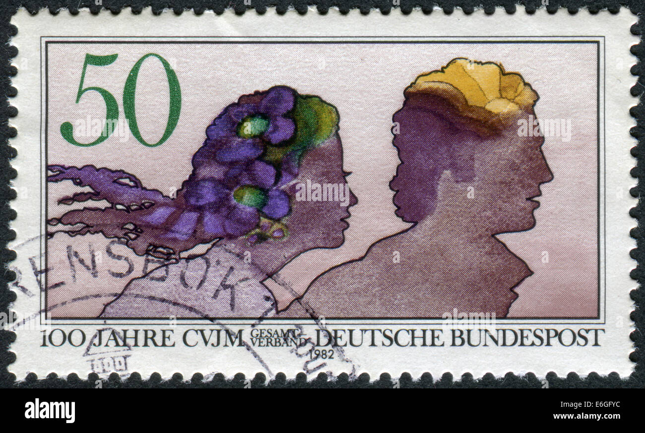 Postage stamp printed in Germany, dedicated to the Centenary Young Men's Christian Association (YMCA) Stock Photo