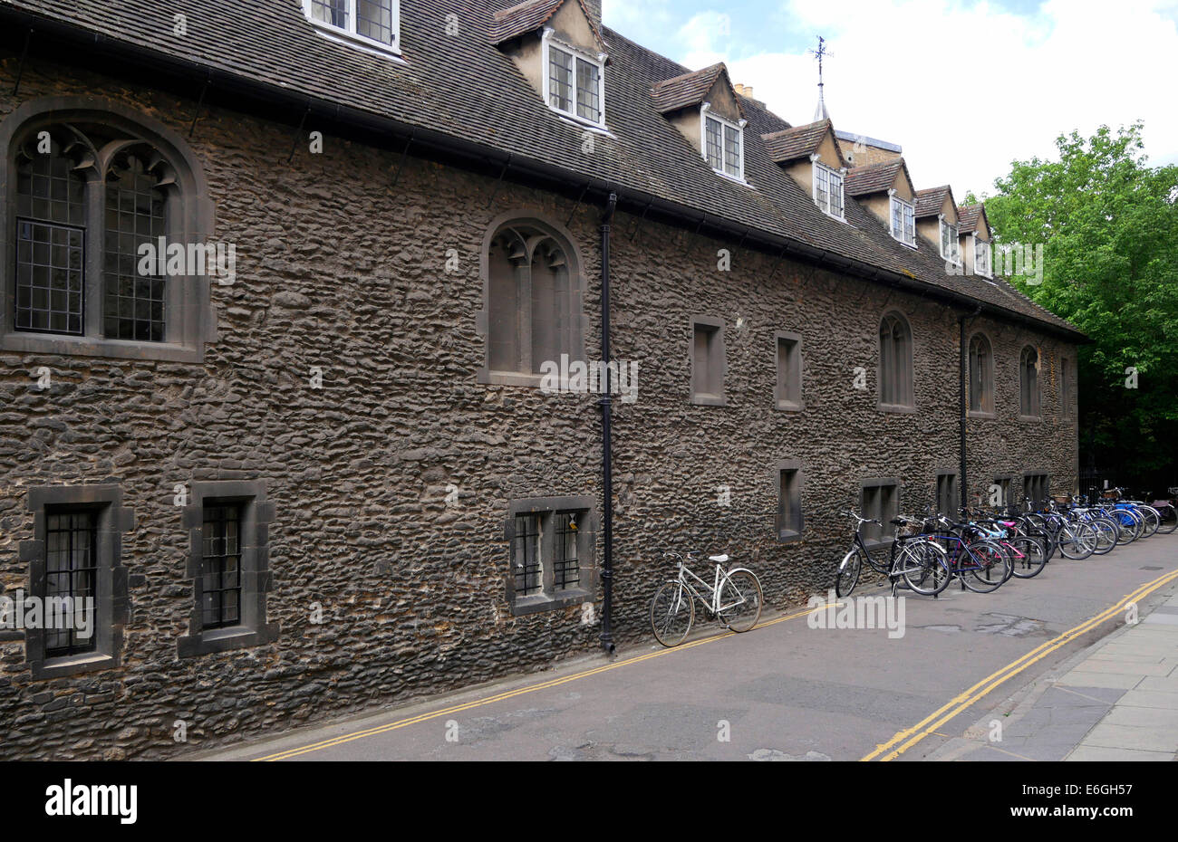 Ancient walls and bicycles in Free School Lane, central Cambridge, England Stock Photo