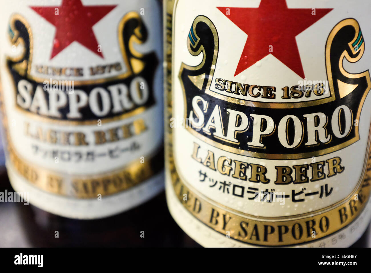 Two bottles of Japan-made Sapporo beer. Stock Photo