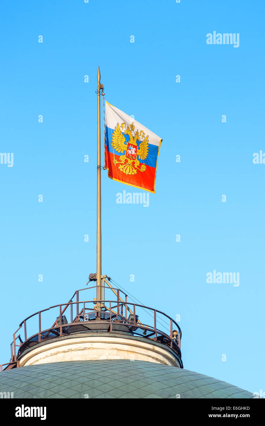 raised the Russian flag on the roof of a government building in the Kremlin Stock Photo