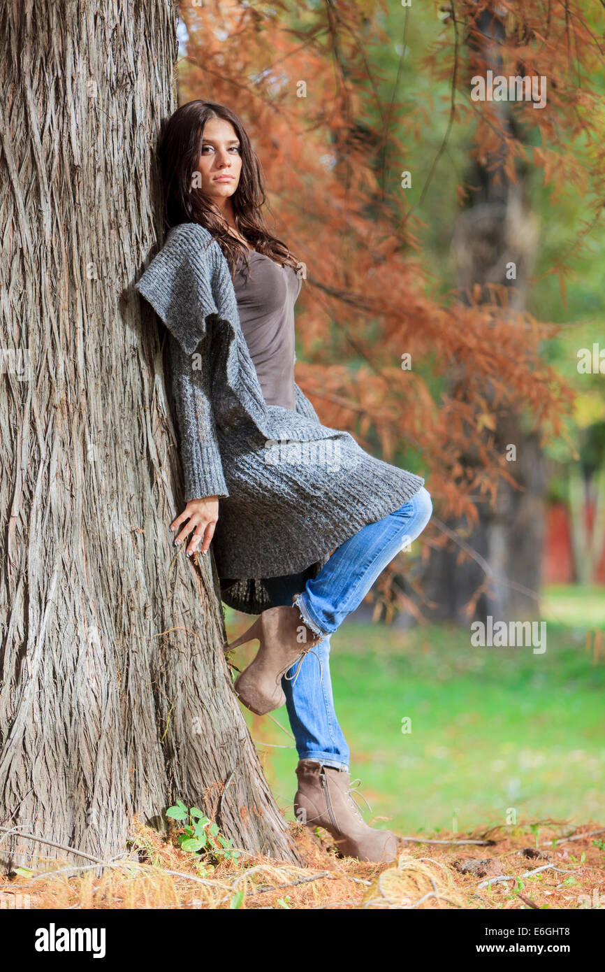 Young woman at autumn park Stock Photo - Alamy