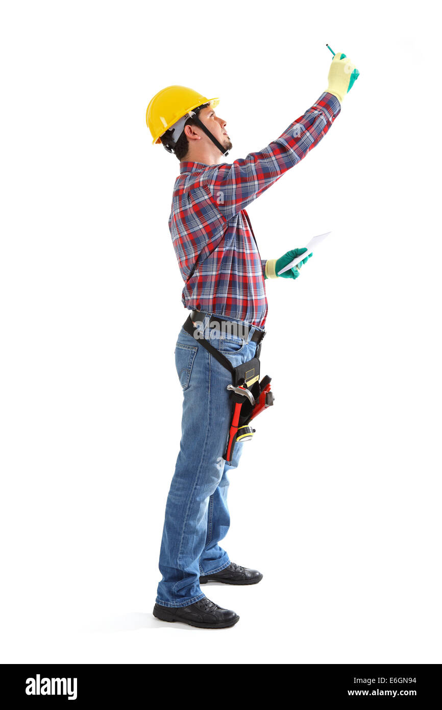 Worker is taking measurements with the pen on the white background. Isolated on white Stock Photo