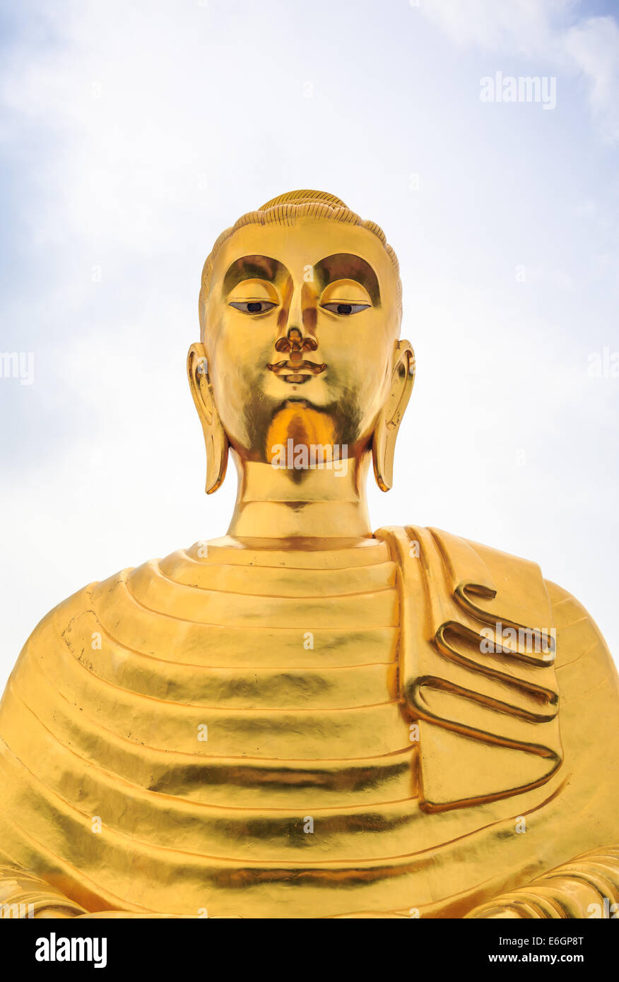 Golden Buddha's image located in a Thai temple. Stock Photo
