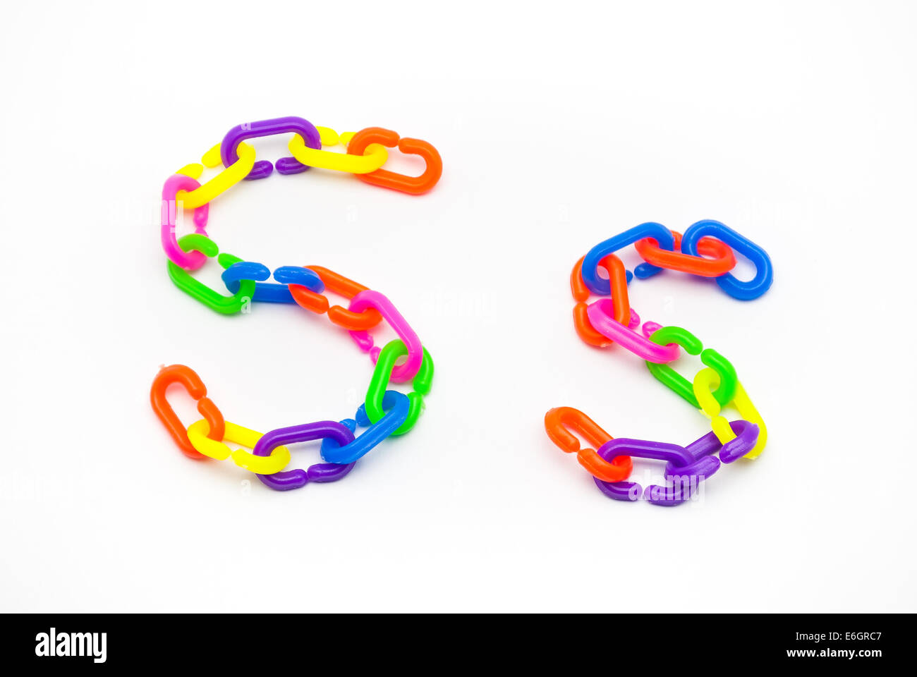 S and s Alphabet, Created by Colorful Plastic Chain. Stock Photo