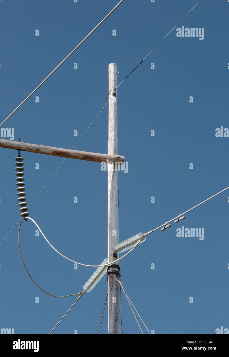 Power line towers and blue sky Stock Photo - Alamy