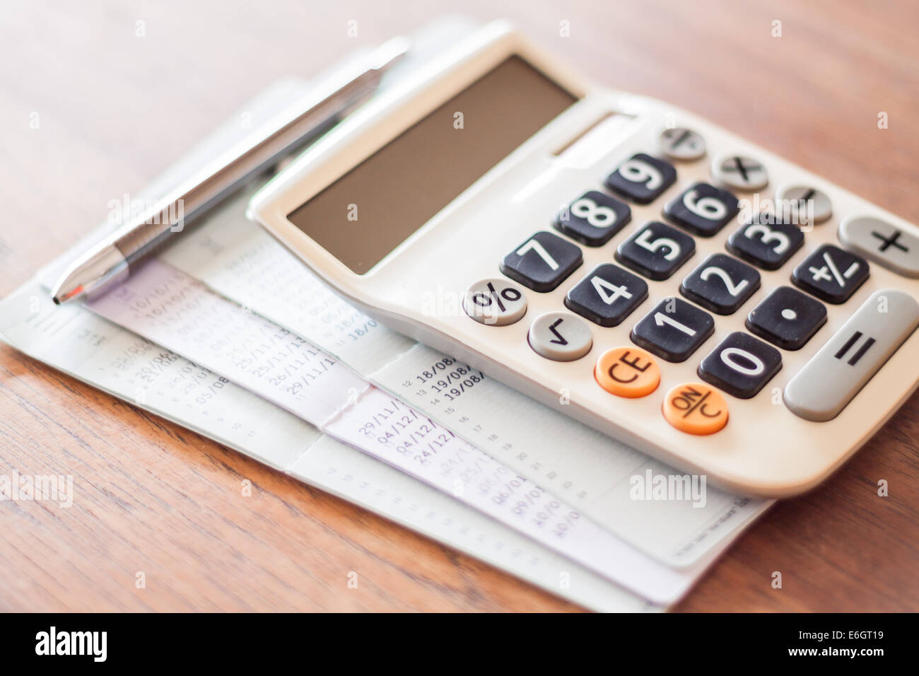 Calculator and pen with bank account passbook, stock photo Stock Photo