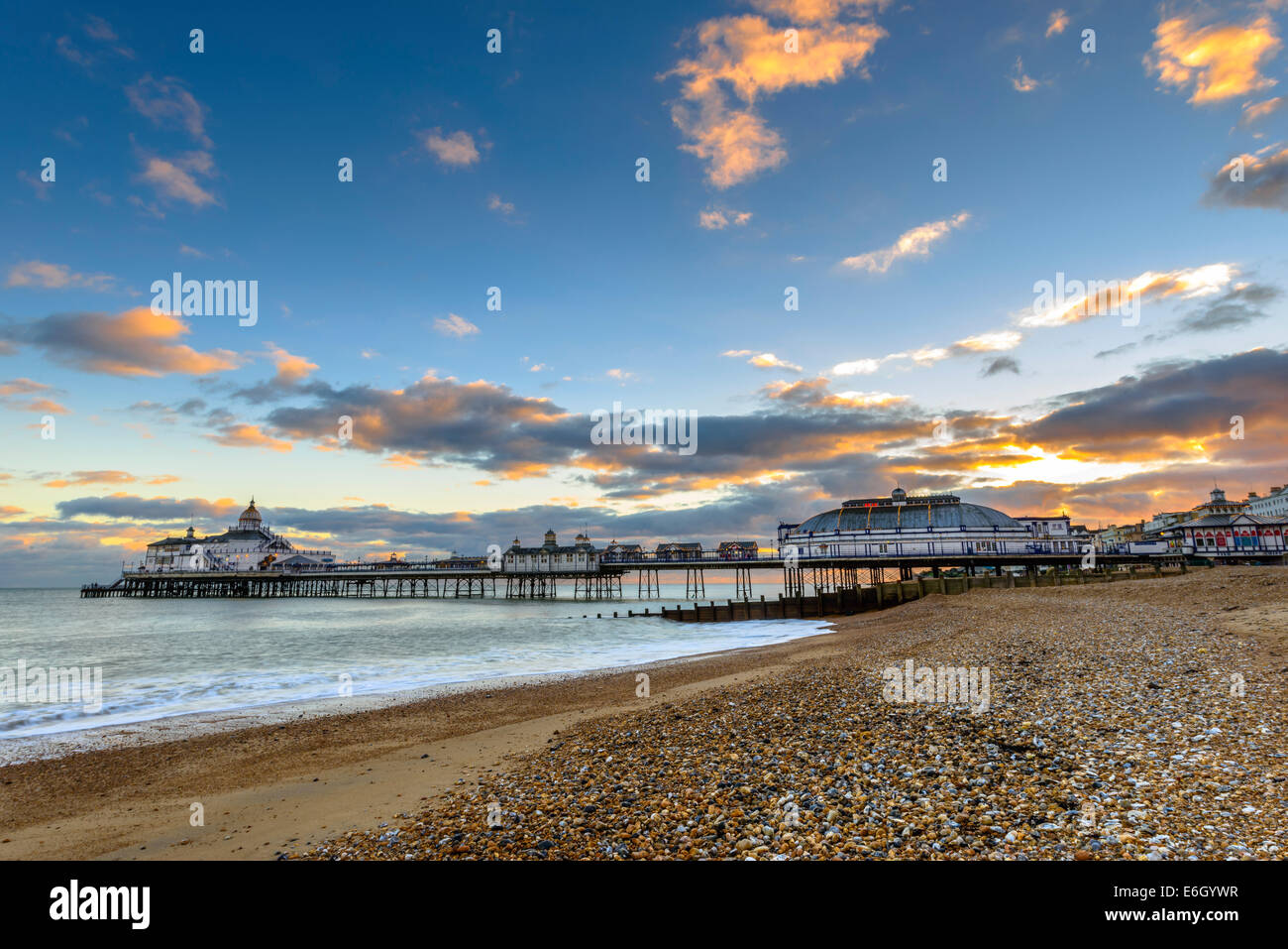 Eastbourne Pier and beach at sunset, East Sussex, England, UK Stock Photo