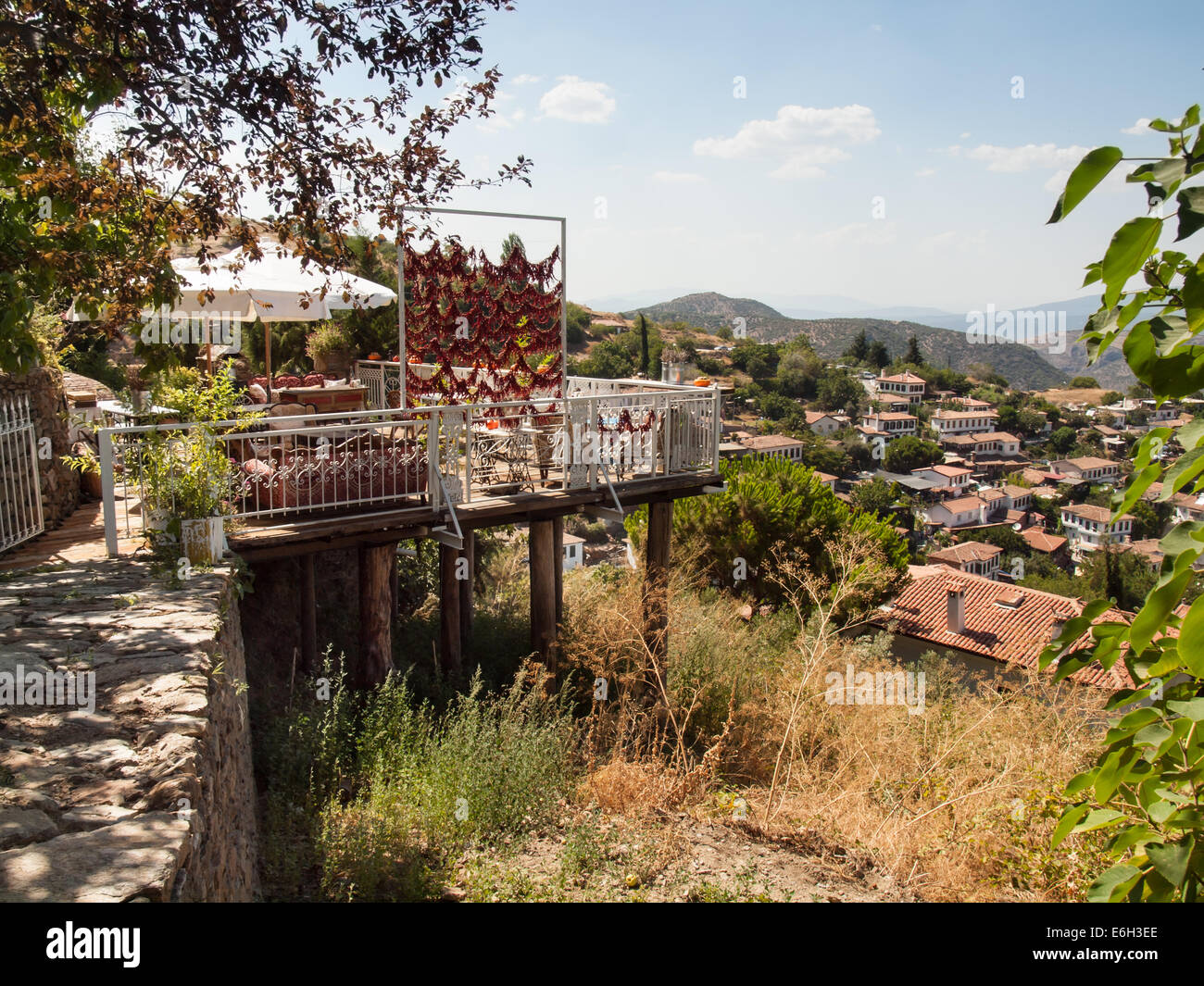 view over  the turkish village of sirince in izmir province with garden terrace in the foreground Stock Photo