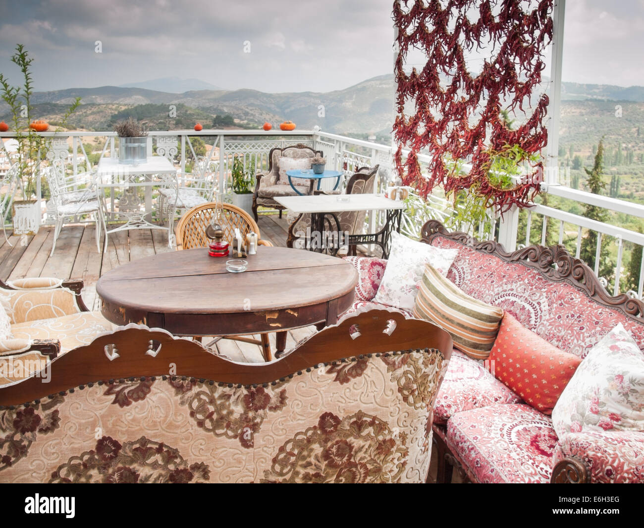 restaurant terrace with view over  the turkish village of sirince in izmir province on an overcast day Stock Photo
