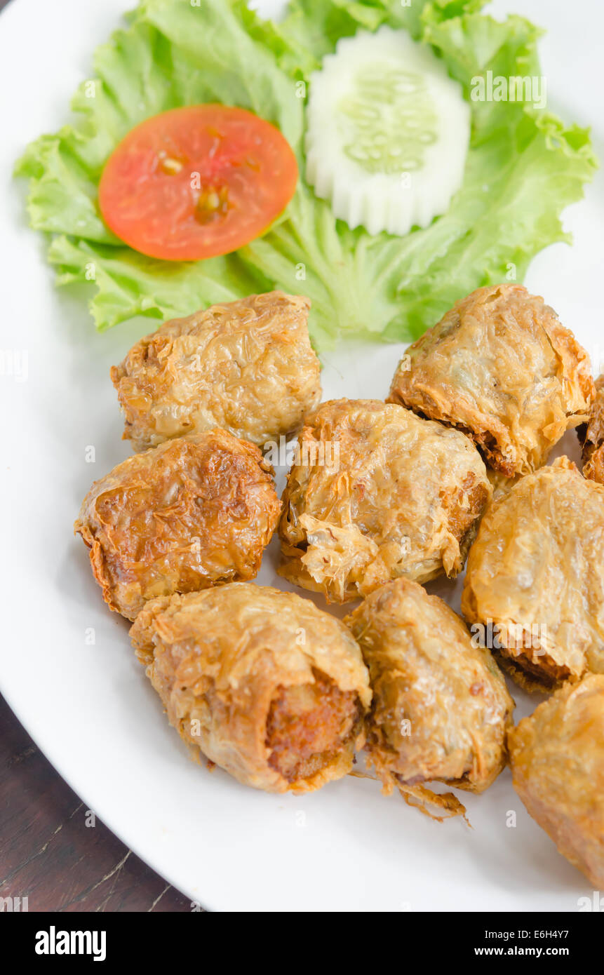 deep fried crab meat roll cake on white dish , chinese food Stock Photo
