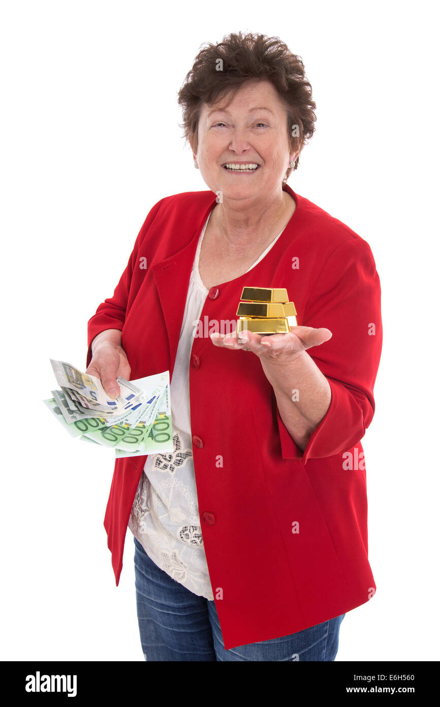 Isolated senior woman with cash and gold: concept for pension and heritage. Stock Photo
