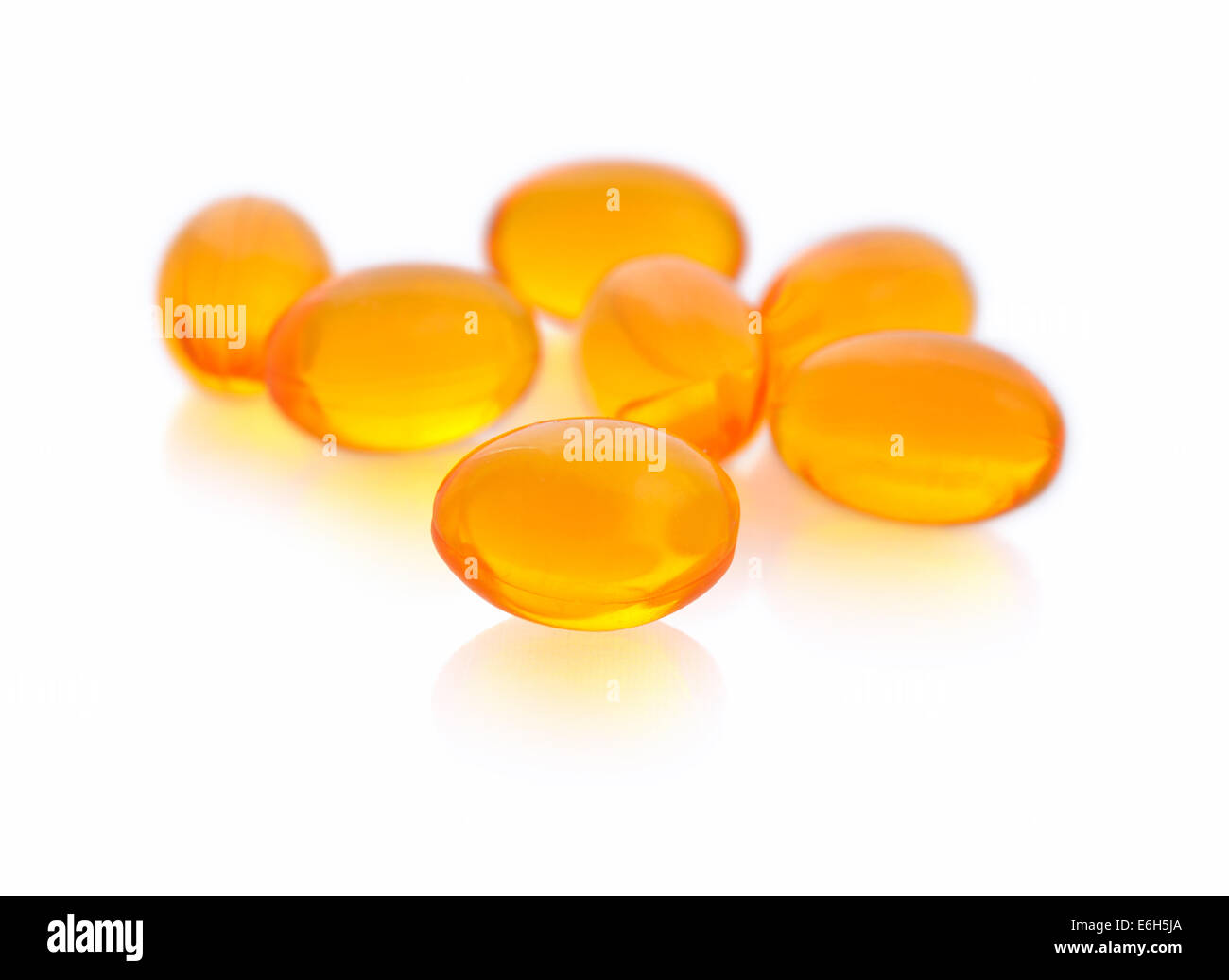 Cod liver oil omega 3 gel capsules isolated on white background Stock
