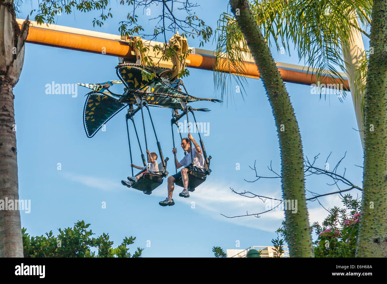 father and son riding the pteranodon flyers ride in jurassic park at universal studios rides pteranodon flyers