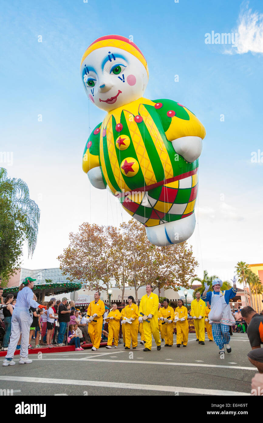 Clown helium balloon with handlers in Macy's Holiday Parade in Universal  Studios, Orlando, Florida Stock Photo - Alamy