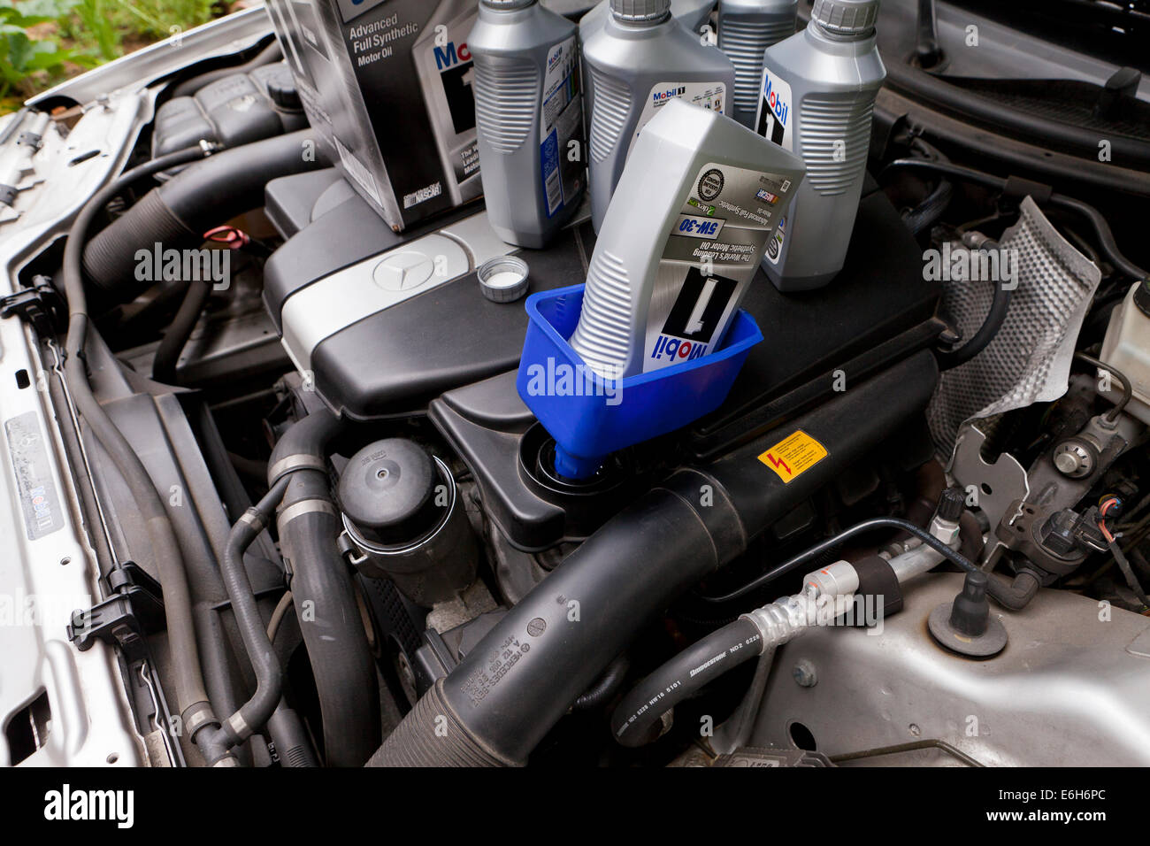Mobile 1 motor oil in funnel USA Stock Photo Alamy