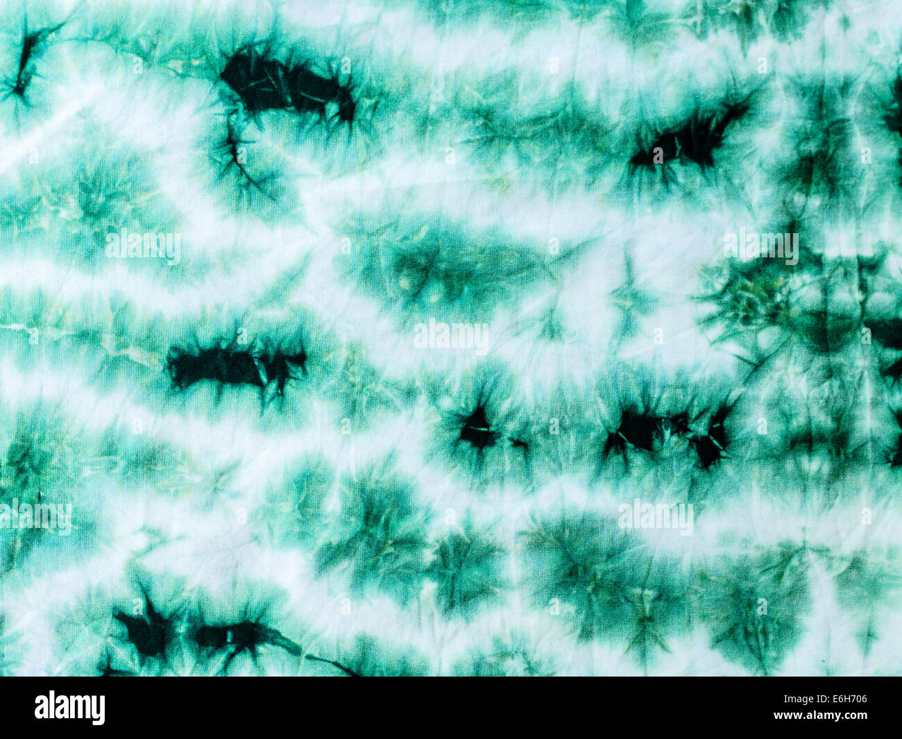 Light and dark green tie dyed fabric background Stock Photo Alamy