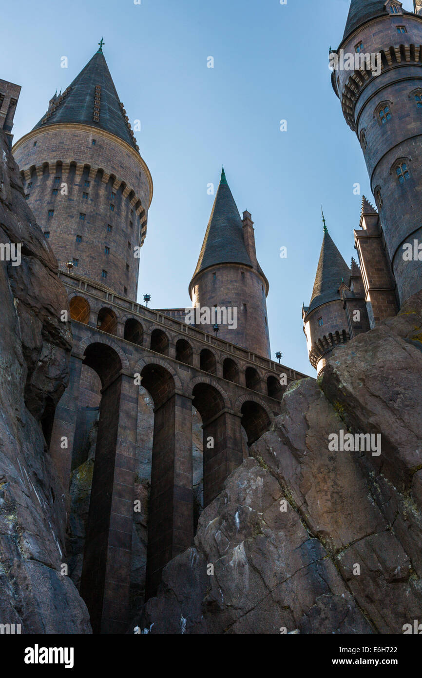 Spires and towers of Hogwarts Castle rise to the sky in The