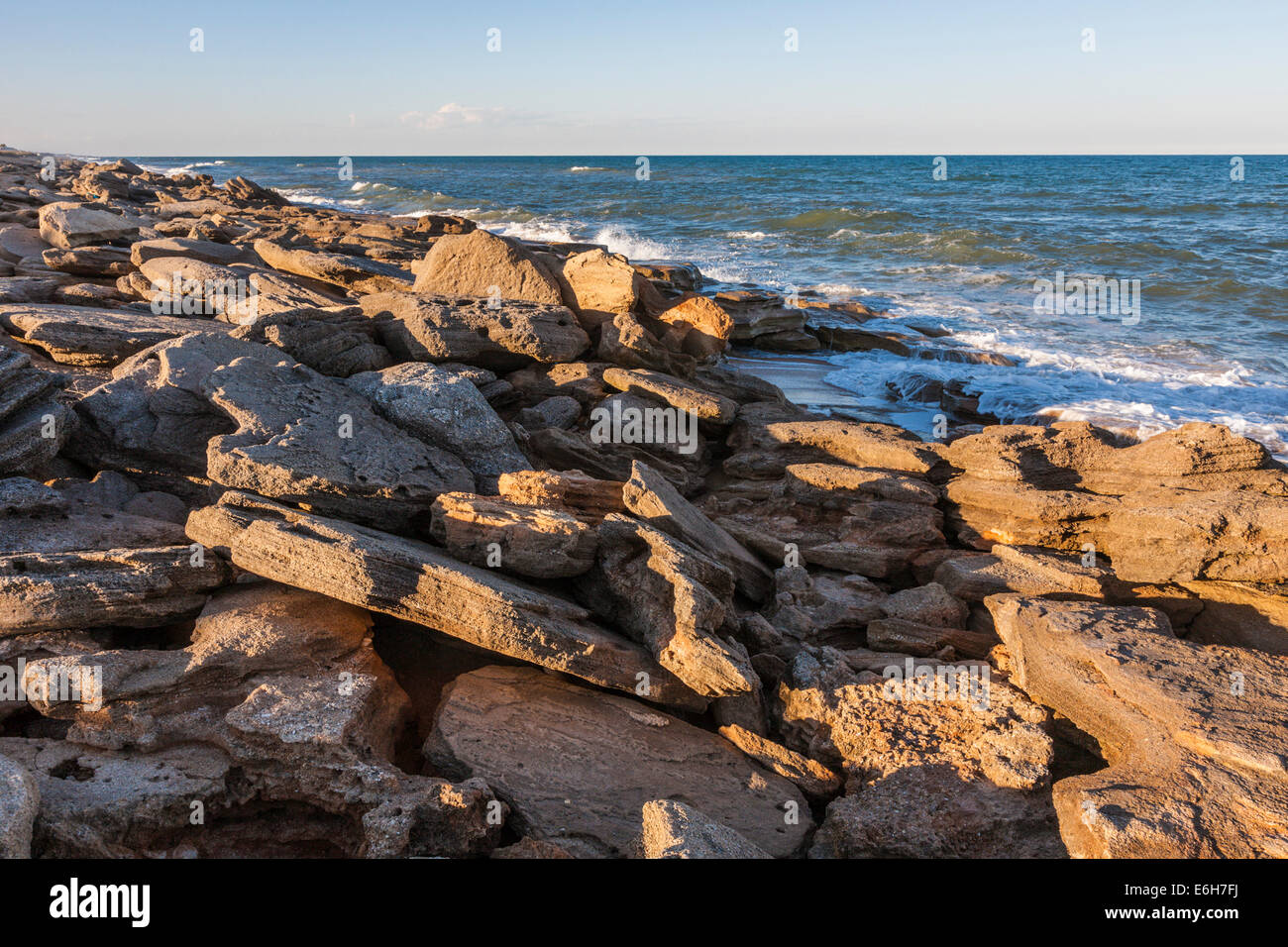 Coquina rock formations along coast of Atlantic Ocean at Washington