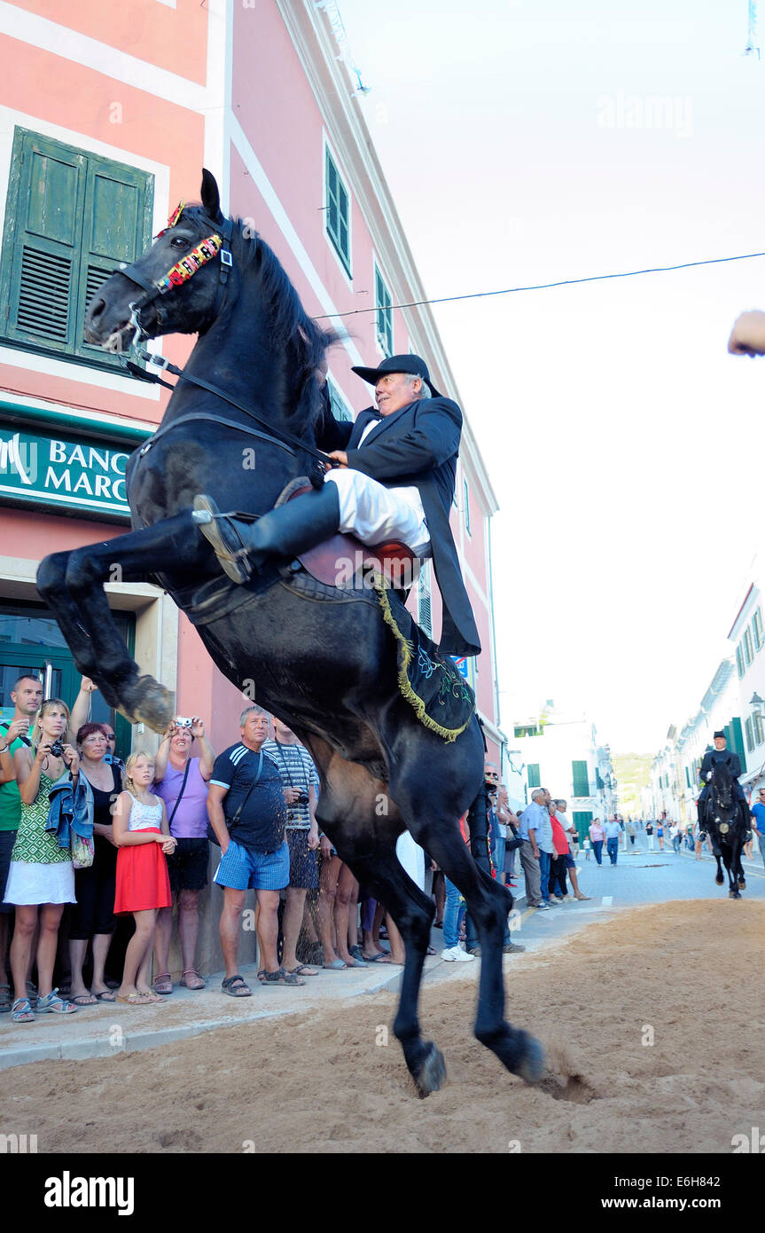 A horse rearing, typical horse riding during the traditional celebration of San Nicolas in Menorca, Spain. Stock Photo