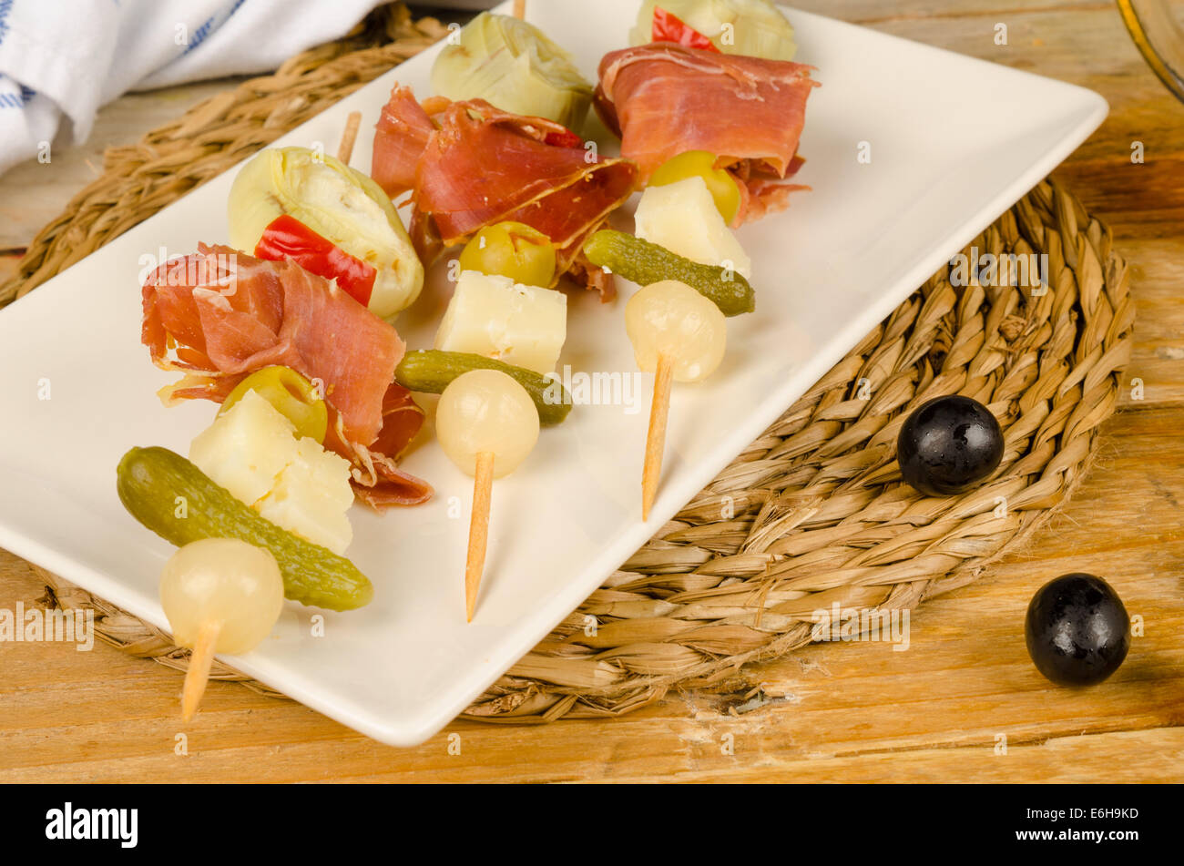 Serrano ham tapa on a skewer, Spanish appetizer Stock Photo Alamy
