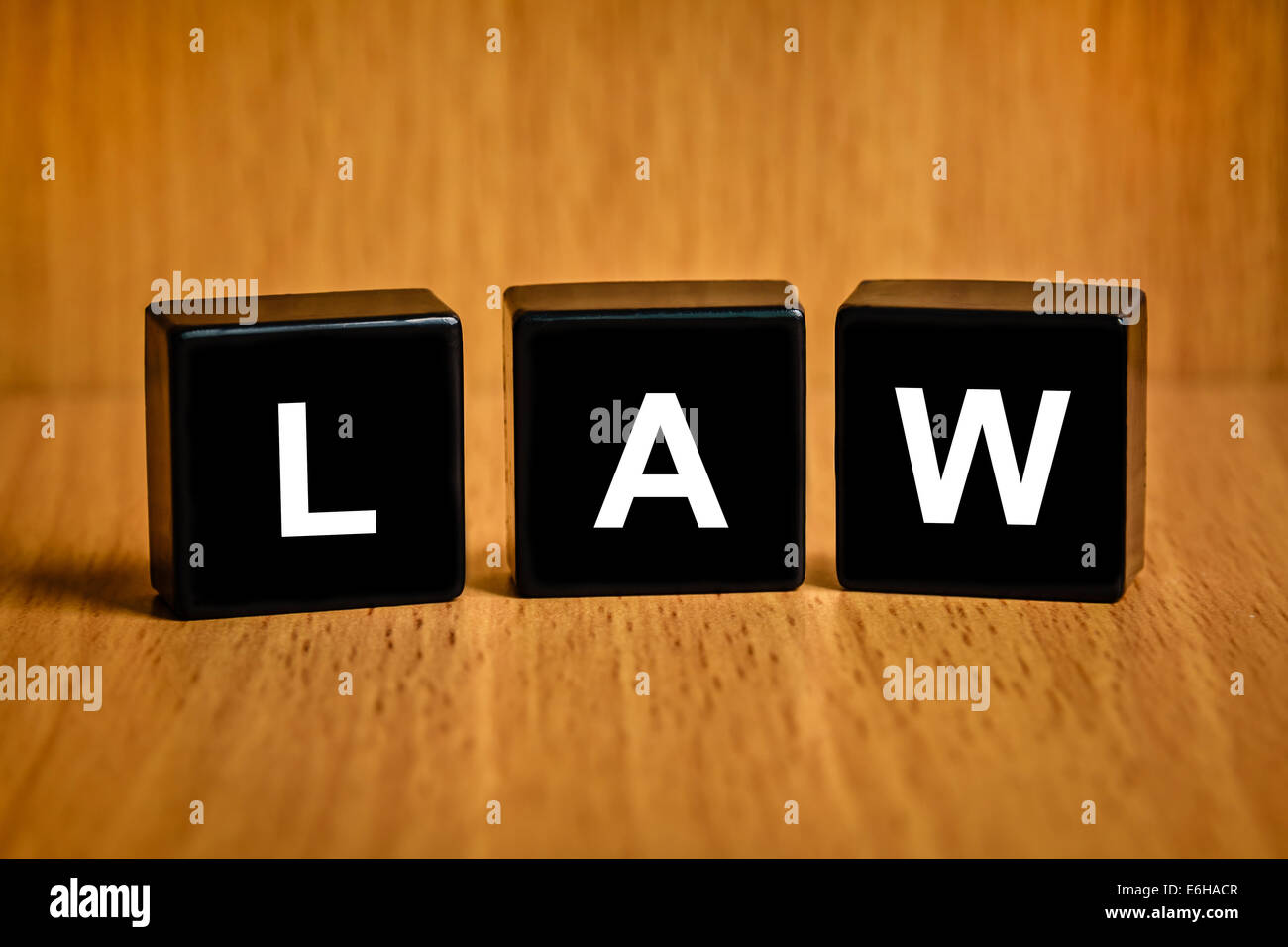 law text on black block Stock Photo Alamy