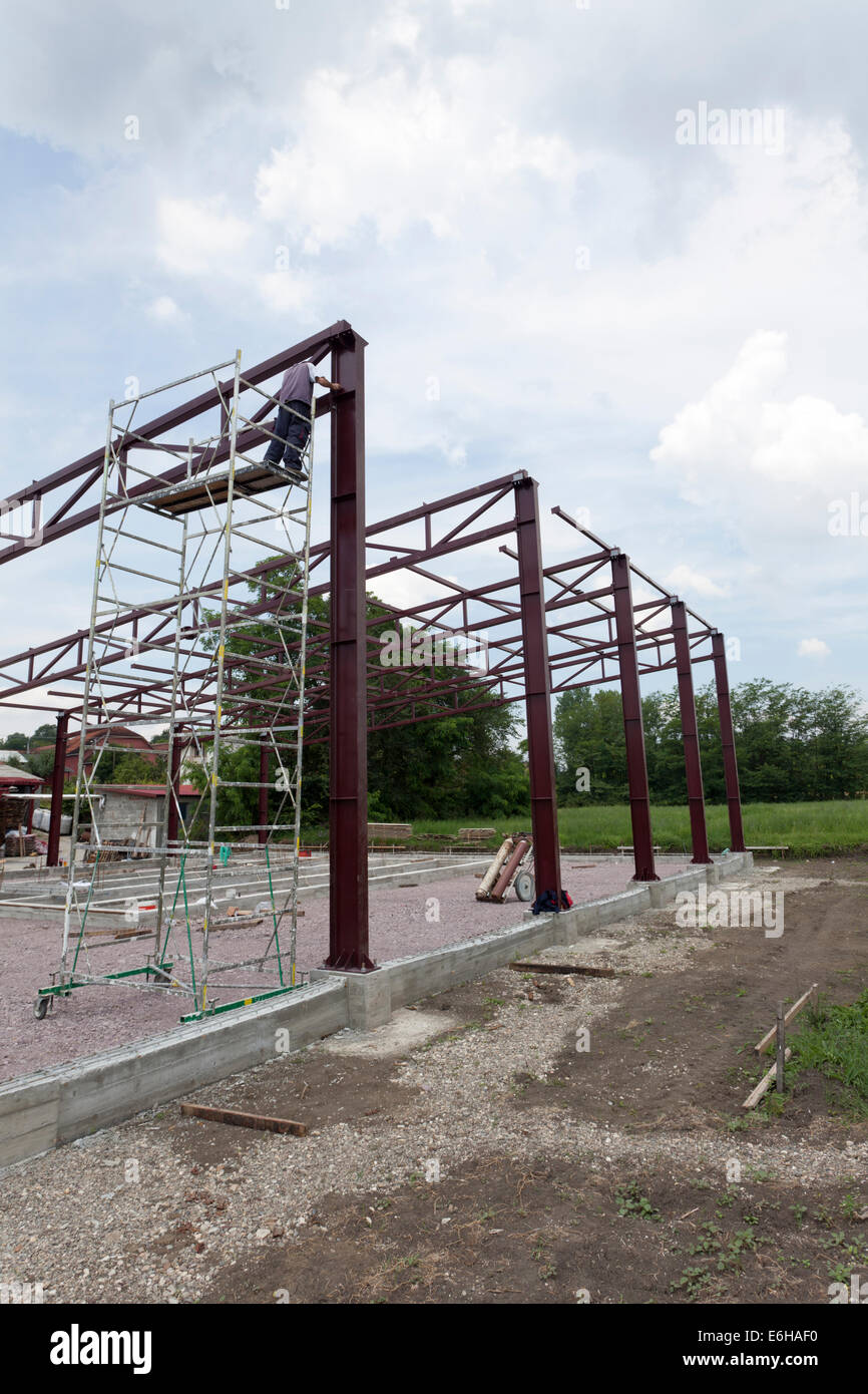 Work site and large steel frame of a large building Stock Photo