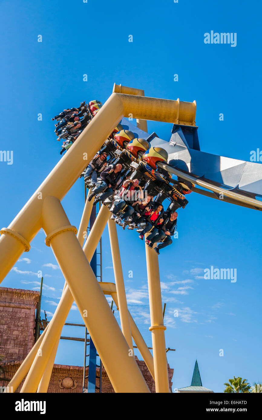 Park guests riding Montu roller coaster at Busch Gardens in Tampa