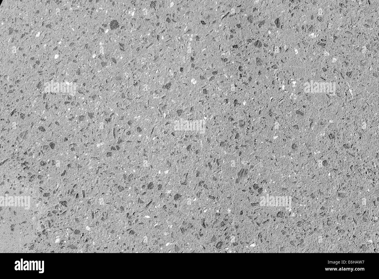 Close up of exposed aggregate concrete wall panel with uncolored concrete Stock Photo