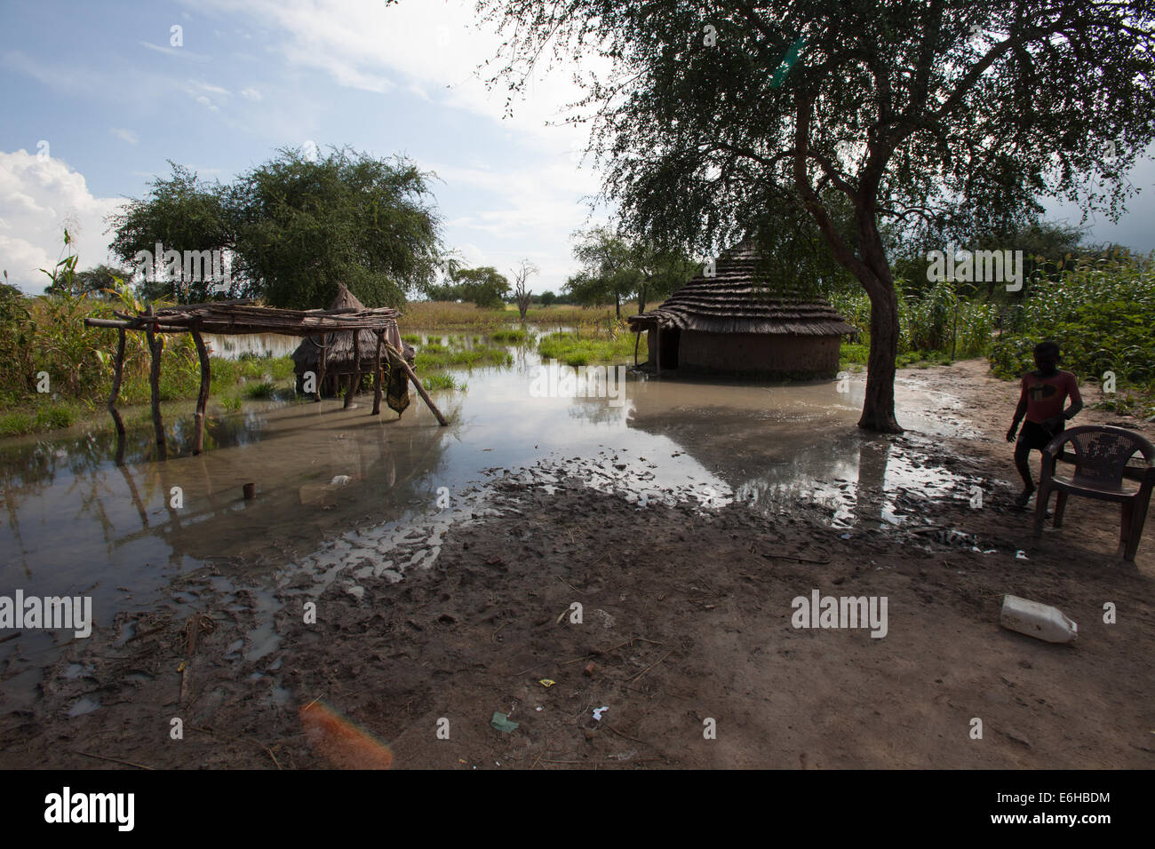 Agok Child surveys flooded famland at Abathok village near Agok, Abyei ...