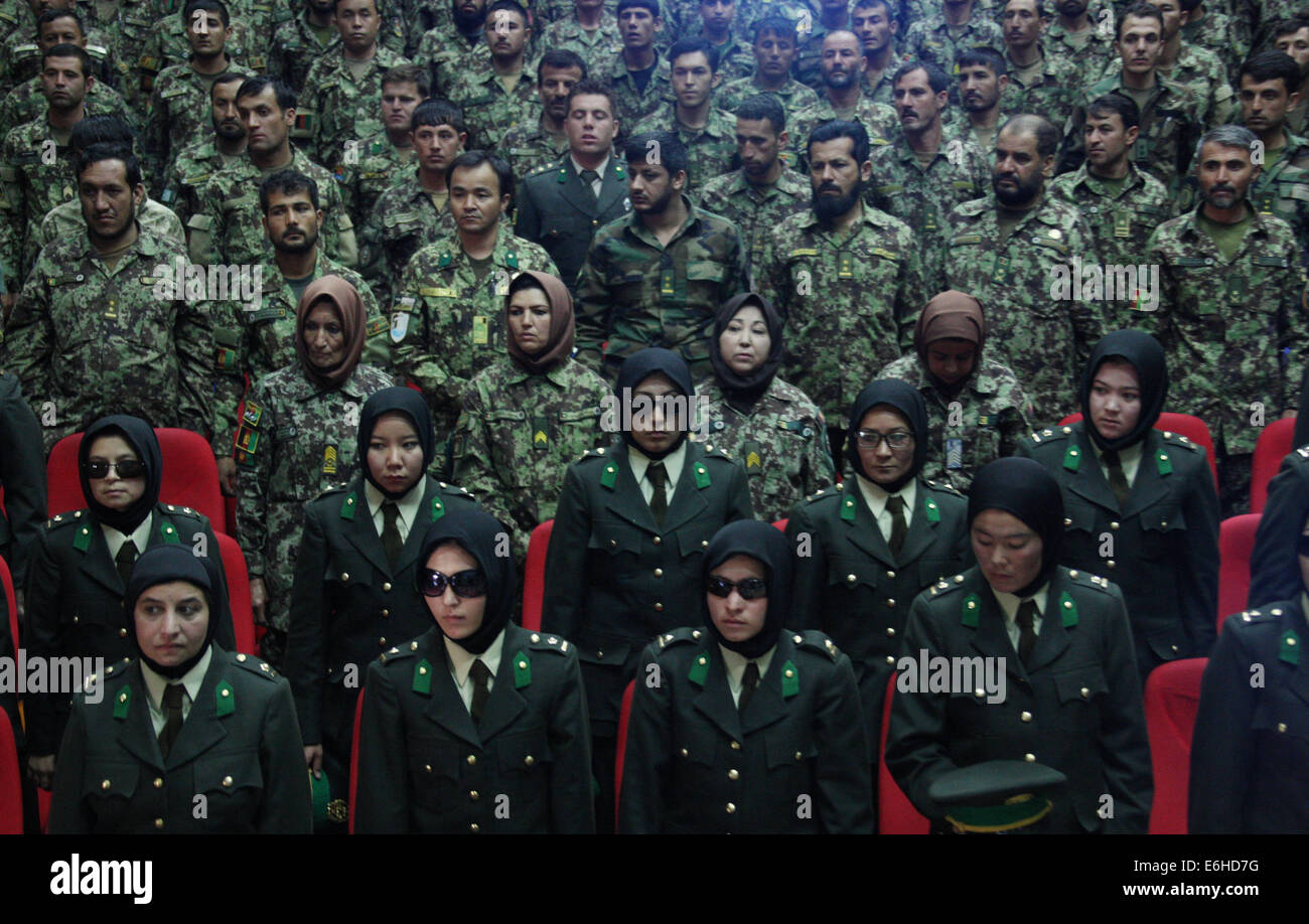 Kabul, Afghanistan. 24th Aug, 2014. Newly-graduated female Afghan National Army (ANA) officers attend the graduation ceremony in Kabul, Afghanistan on Aug. 24, 2014. A total of 30 female army officers graduated from Kabul Military Training Center (KMTC) on Sunday and commissioned to ANA, General Aminullah Paktiani commander of KMTC said. Credit:  Ahmad Massoud/Xinhua/Alamy Live News Stock Photo