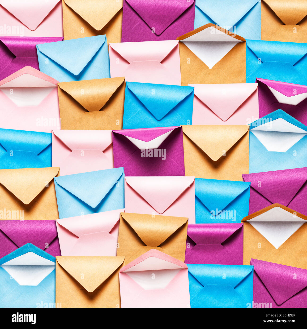 Background with rows of colorful envelopes, Pink, blue and brown envelope collection. Stock Photo