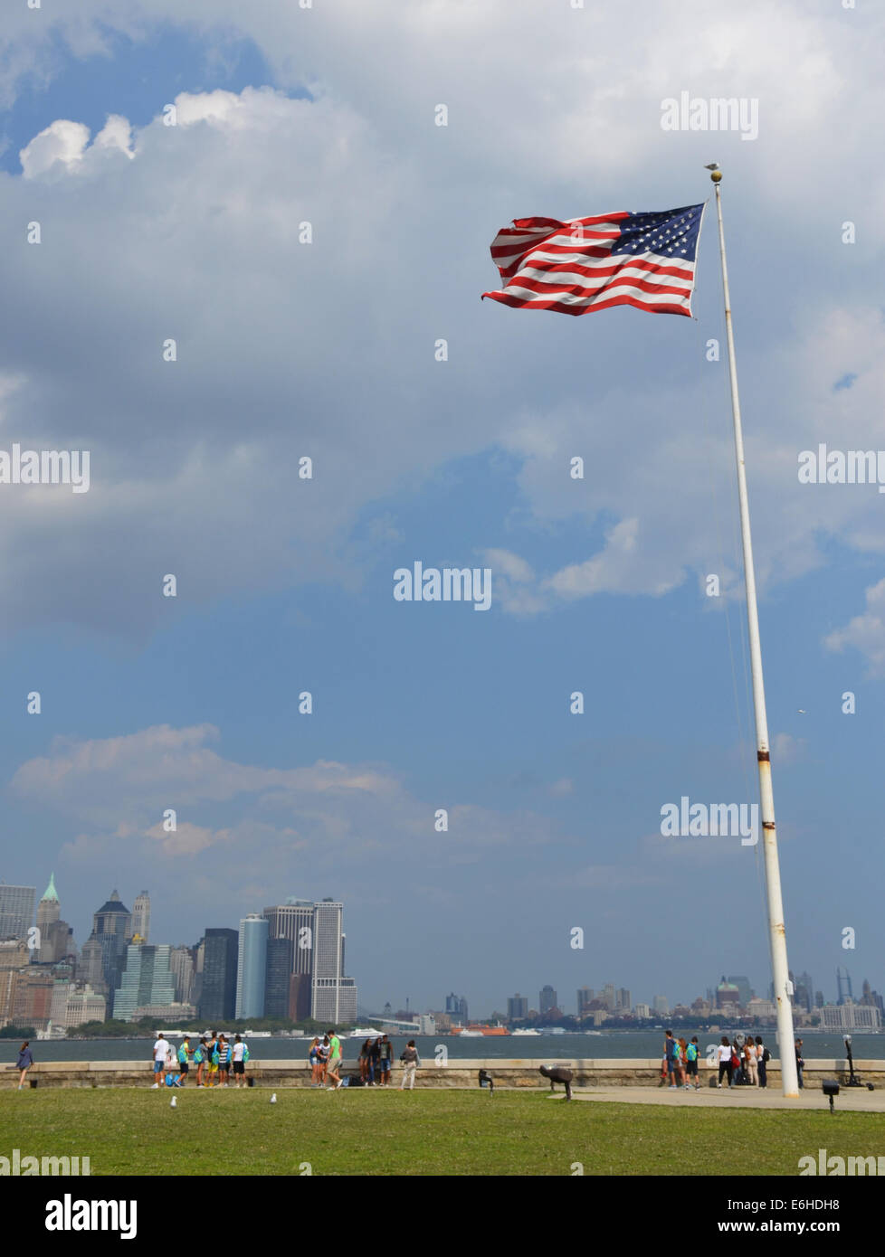 American flag waving in blue sky Stock Photo - Alamy