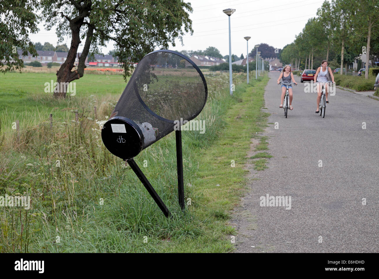 In Netherlands, I saw these trash bins installed near bike lanes so