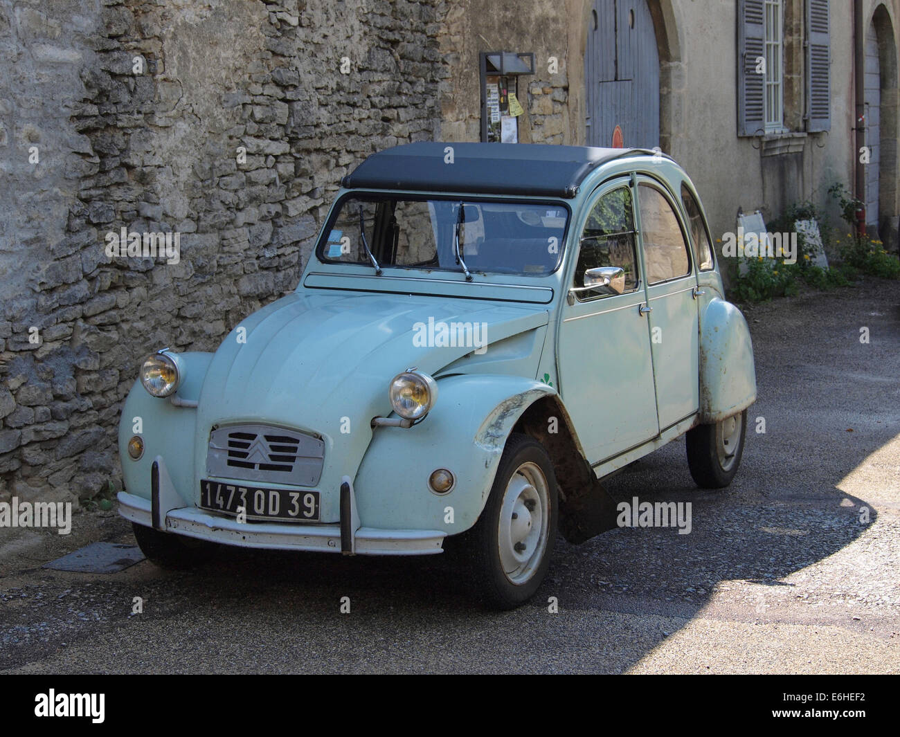 Light blue vintage Citroen 2CV car parked in a village in France Stock Photo