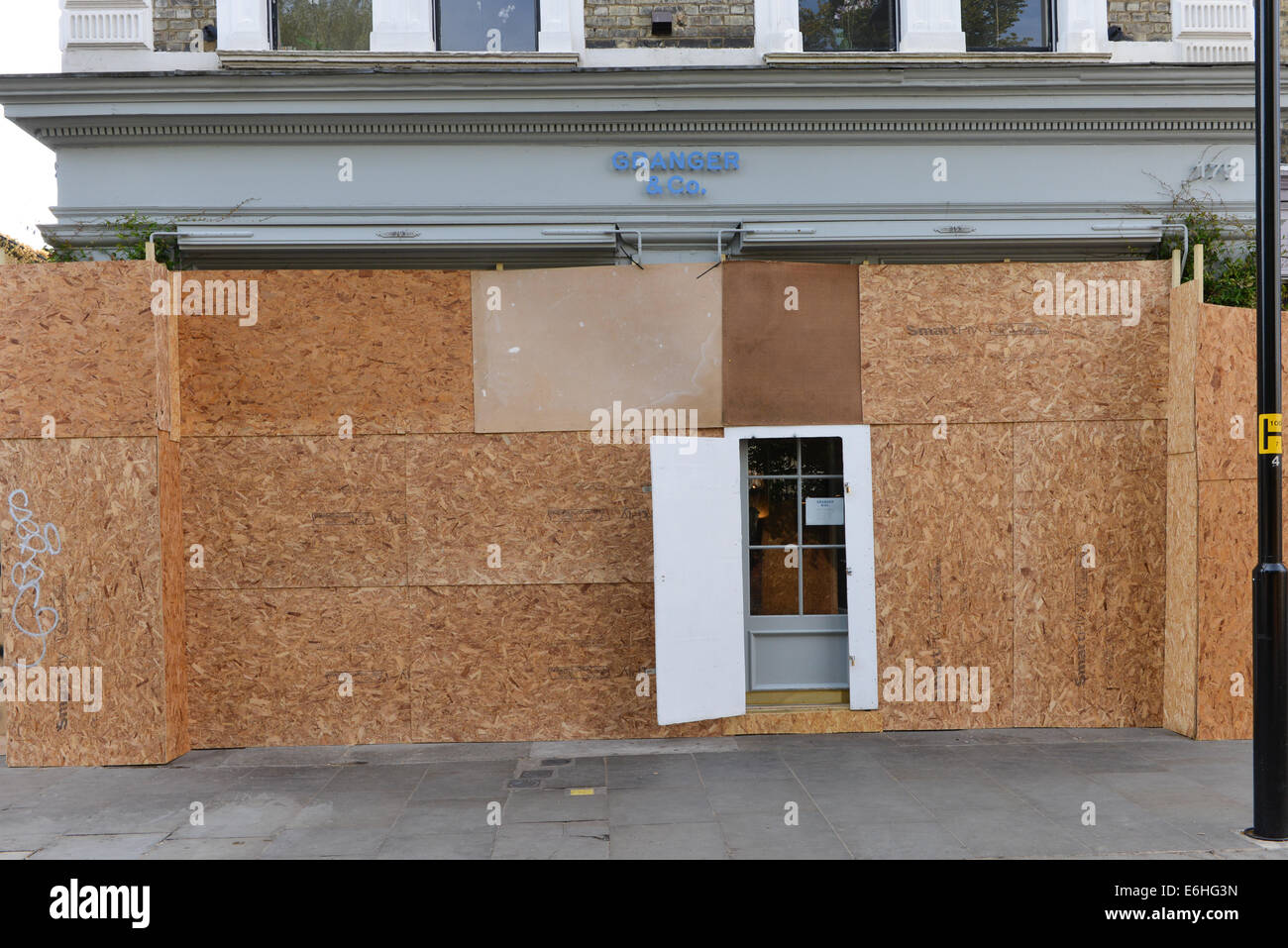 Westbourne Grove, Notting Hill, London, UK. 24th August 2014. Most commercial and private properties are boarded up along the route of the Notting Hill carnival against the potential for damage. Credit:  Matthew Chattle/Alamy Live News Stock Photo