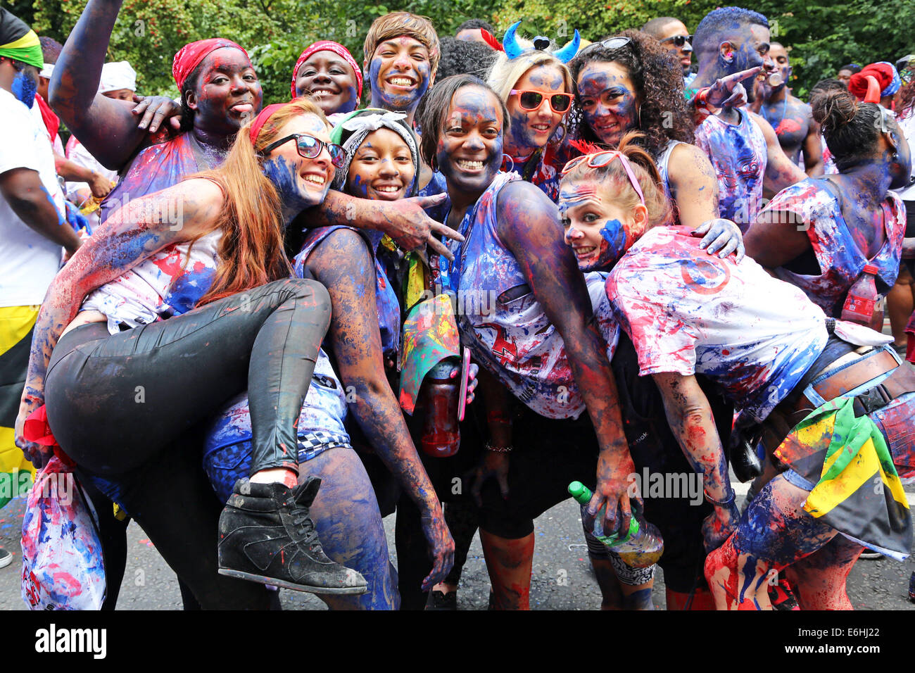 London, UK. 24th August 2014. Participants in the parade on Children's Day at Notting Hill Carnival 2014, London. The first day of the carnival is traditionally for children but plenty of adults join in as well. Credit:  Paul Brown/Alamy Live News Stock Photo