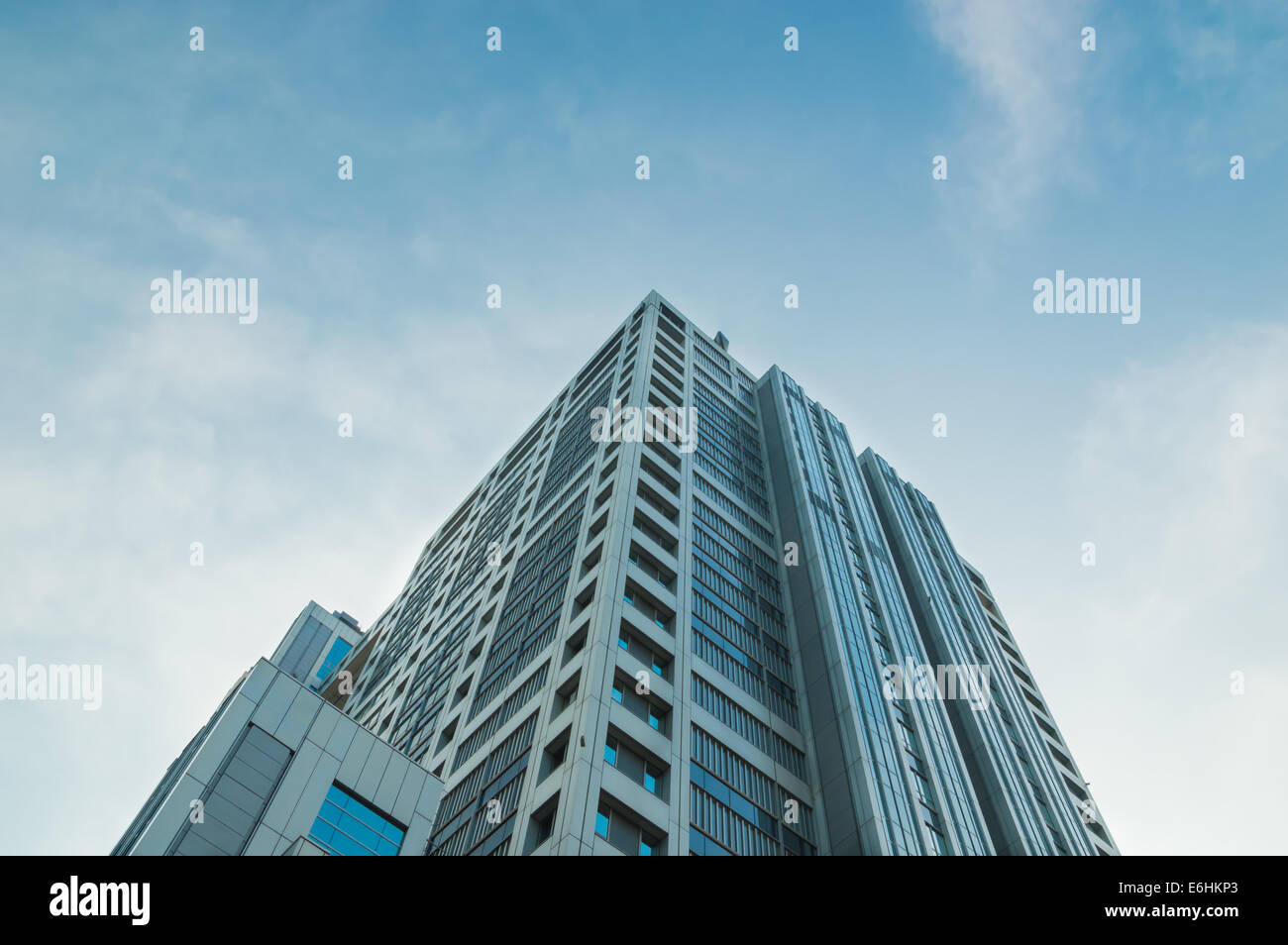 a tall building against clear blue sky Stock Photo - Alamy