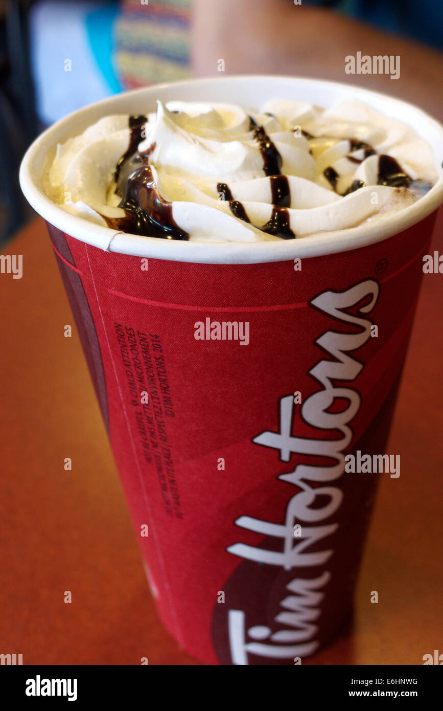 A Tim Hortons coffee in a paper cup Stock Photo