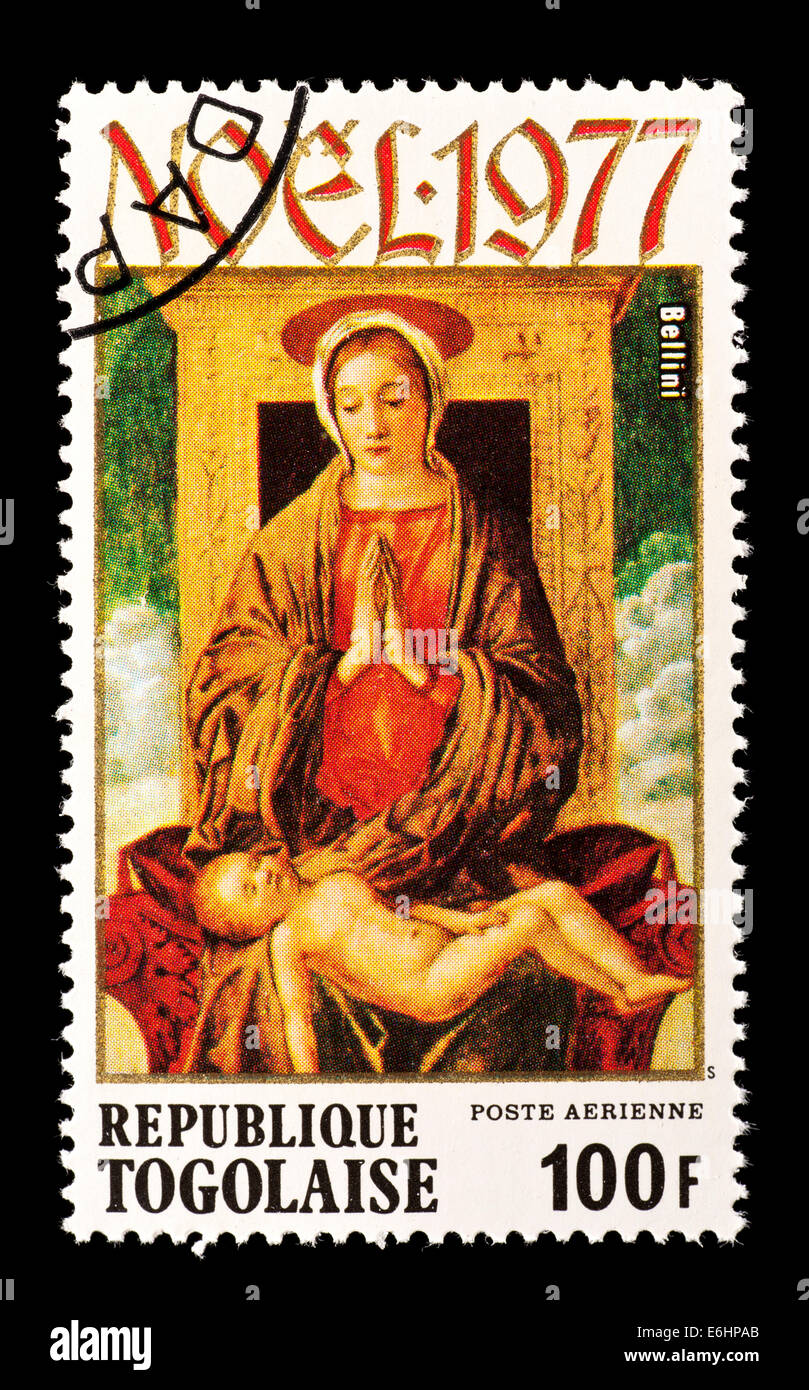 Postage stamp from Togo depicting the Bellini painting of the Virgin and child. Stock Photo
