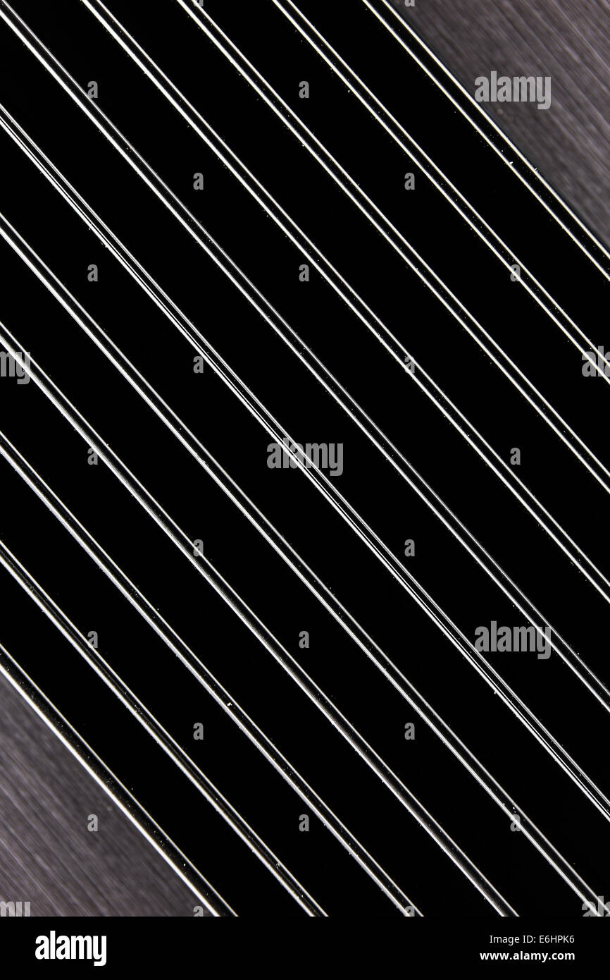 Slanting parallel aluminum pipes abstract background or texture Stock Photo