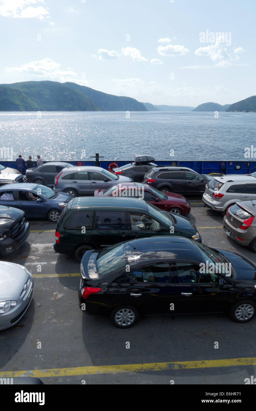Cars on the Baie Ste Catherine to Tadoussac ferry crossing the Saguenay