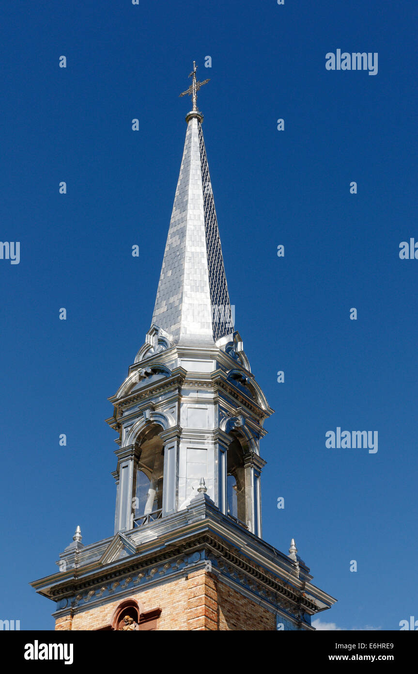 A shiny metal spire on a church in Quebec canada Stock Photo