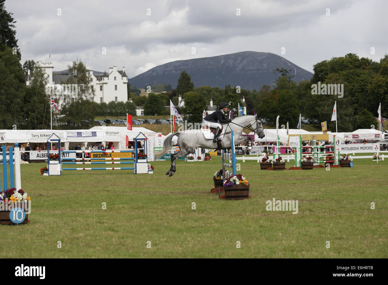 Blair Atholl, Scotland. 24th Aug, 2014. Blair Castle International Horse Trials. CCI showjumping with Blair Castle in the background. Credit:  Action Plus Sports/Alamy Live News Stock Photo
