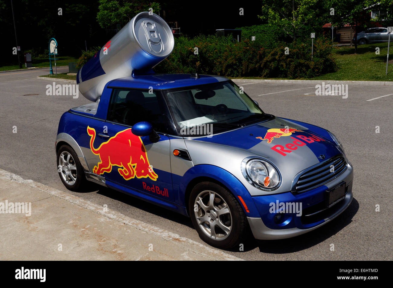 A blue / red / gray Red Bull print pattern Mini Cooper car, outside News  Photo - Getty Images