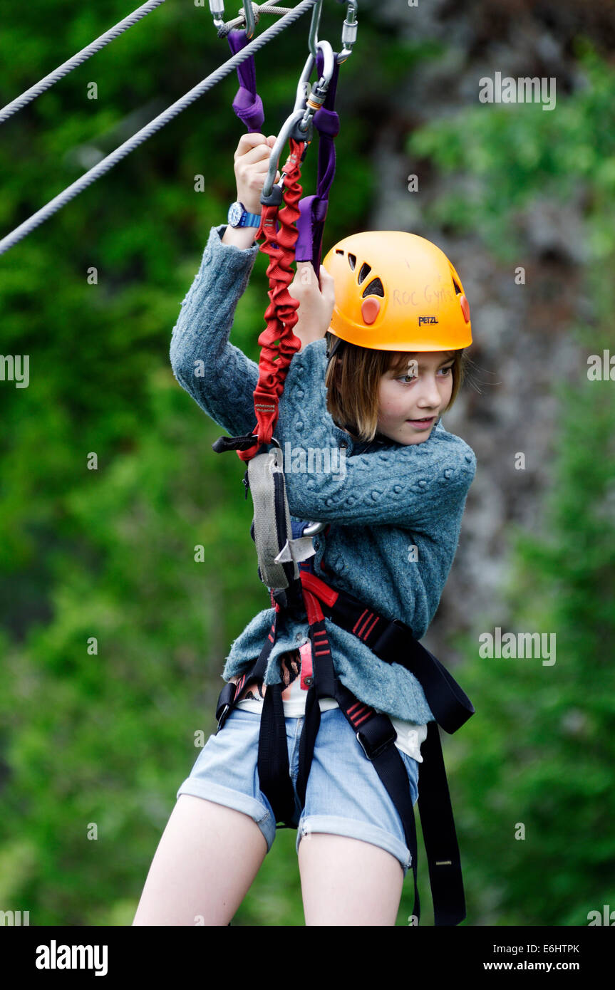 A young girl on a zip line Stock Photo Alamy