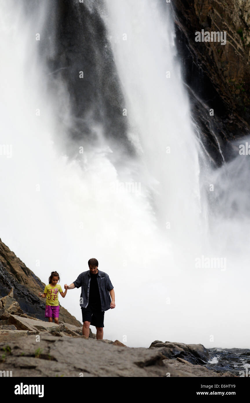 A man and daughter in front of Chute Montmorency waterfall near Quebec City Stock Photo